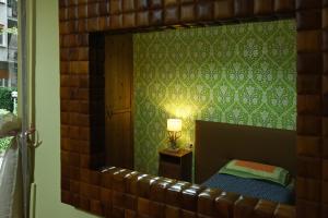 Postel nebo postele na pokoji v ubytování B&B Sant'Agostino