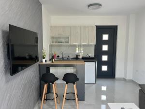 A kitchen or kitchenette at Apartments MASIMO