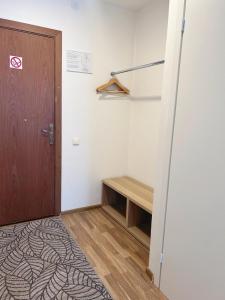 Postel nebo postele na pokoji v ubytování KAUNO JACHTKLUBAS Baltosios Burės