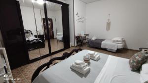 Postel nebo postele na pokoji v ubytování B&B Le Corti