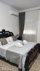 Postel nebo postele na pokoji v ubytování B&B Le Corti