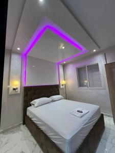 Letto o letti in una camera di appartement riad sofia