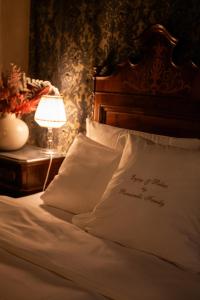 Posteľ alebo postele v izbe v ubytovaní Novecento Boutique Hotel