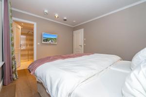 Ein Bett oder Betten in einem Zimmer der Unterkunft Alva 1