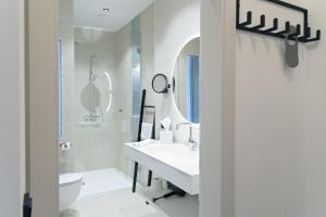 Baðherbergi á FrühstücksHotel Scharinger