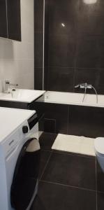 Kúpeľňa v ubytovaní Híd Köz Penthouses Apartman