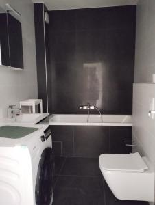 Kúpeľňa v ubytovaní Híd Köz Penthouses Apartman