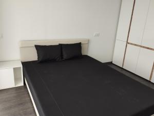 Posteľ alebo postele v izbe v ubytovaní Híd Köz Penthouses Apartman