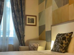 Hotel Maxim Axialにあるベッド