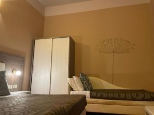 Hotel Maxim Axialにあるベッド