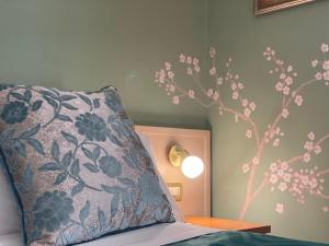 Postel nebo postele na pokoji v ubytování Hotel Maxim Axial