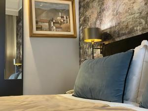 Hotel Maxim Axialにあるベッド