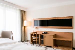 Televízia a/alebo spoločenská miestnosť v ubytovaní Ambient Hotel & Thermal Spa