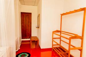 Palanda nebo palandy na pokoji v ubytování Aroma Heaven Homestay