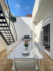 En balkon eller terrasse på UIM Mediterraneo CASA Gomez Ferrer Wifi