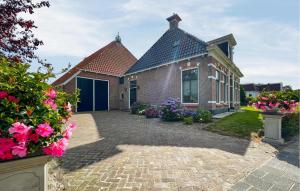 Vrt pred nastanitvijo Nice Home In Oudeschoot With Wifi
