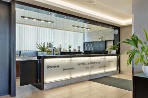 TV a/nebo společenská místnost v ubytování Austria Trend Hotel Salzburg Messe