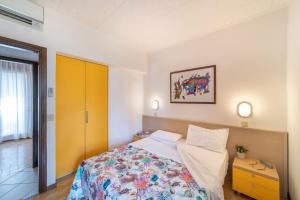 Postel nebo postele na pokoji v ubytování Villaggio Club dei Pini