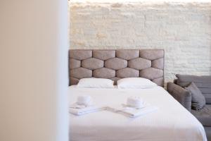 Postel nebo postele na pokoji v ubytování Christian Studio Apartments