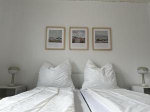 Postel nebo postele na pokoji v ubytování Küstenbude Strandbude