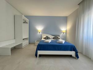 Letto o letti in una camera di Pasitea Tropea
