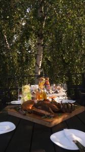 a table with a turkey on top of it at Rooftop terrace Green Sky in Vilnius