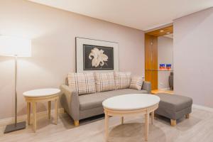 Ruang duduk di 家美瑞品 台北 - Jiamei Hotel
