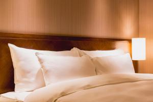 Katil atau katil-katil dalam bilik di 家美瑞品 台北 - Jiamei Hotel
