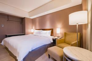 Katil atau katil-katil dalam bilik di 家美瑞品 台北 - Jiamei Hotel