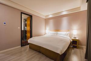 Katil atau katil-katil dalam bilik di 家美瑞品 台北 - Jiamei Hotel