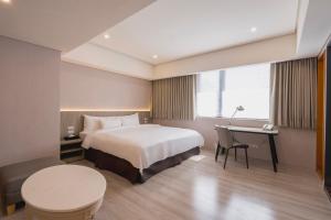 Katil atau katil-katil dalam bilik di 家美瑞品 台北 - Jiamei Hotel