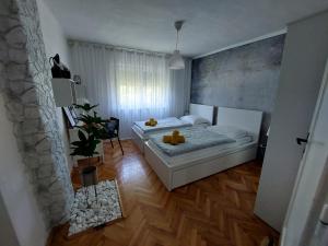 Postel nebo postele na pokoji v ubytování Kuća za odmor Alea Rustica Daruvar