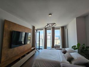Ένα ή περισσότερα κρεβάτια σε δωμάτιο στο Eurovea Tower - Luxury in Heaven