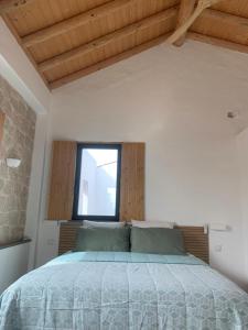 Postel nebo postele na pokoji v ubytování B&B Quinta a Fonte Tavira - Adults Only