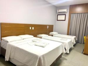 Postel nebo postele na pokoji v ubytování Hotel Rinkao