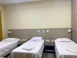 Postel nebo postele na pokoji v ubytování Hotel Rinkao