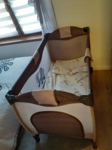 Posteľ alebo postele v izbe v ubytovaní Apartament TatraVika z basenem i widokiem