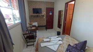 TV a/nebo společenská místnost v ubytování Pousada Praias do Gostoso