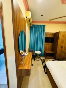 Postel nebo postele na pokoji v ubytování Three Dot Hotel