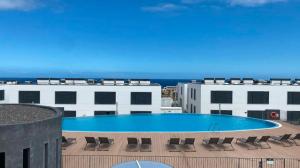 a swimming pool on the roof of a building at Holiday Apartment in Abades with Pool in Santa Cruz de Tenerife
