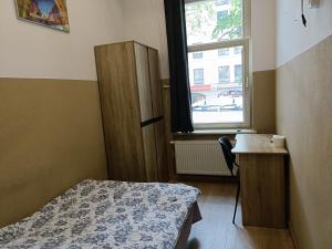 Łóżko lub łóżka w pokoju w obiekcie Pokoje na wynajem Gdańsk