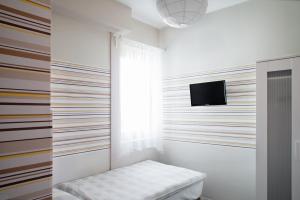 TV a/nebo společenská místnost v ubytování Guest House Family