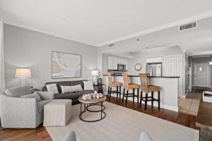 a living room with a couch and a table at Ariel Dunes II 1106 in Destin