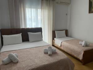 Postel nebo postele na pokoji v ubytování Vila K&M
