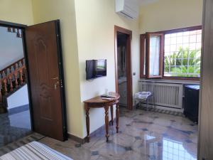 TV a/nebo společenská místnost v ubytování Castelbarco House A