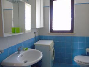 A bathroom at Homiday - Residence Micaene