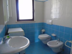 A bathroom at Homiday - Residence Micaene