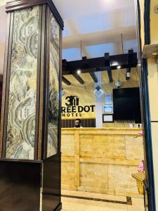 Kuchyň nebo kuchyňský kout v ubytování Three Dot Hotel