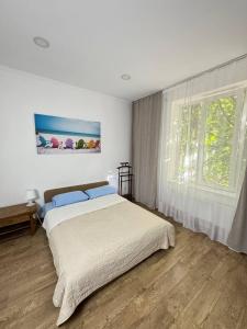 Postel nebo postele na pokoji v ubytování Apartment For Guests with Soul
