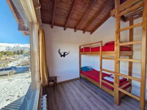 Кровать или кровати в номере Casa Refúgio Patagonia